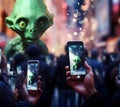 Paranormal green alien visitant posing for people with smartphones