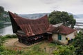 Unusual traditional houses with boat roofs of the Batak people on the island of Sumatra, Indonesia. The traditional architecture o