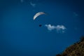 A paraplan in a blue sky