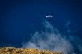 A paraplan in a blue sky