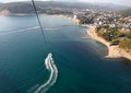 Parasailing above the water near the coast of the city of Dzhubga