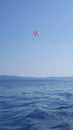 Parasailing in the Adriatic coast in Croatia, Southern Europe - recreational kiting activity