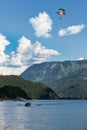 Parasailing behind a speedboat at Austrian Wolfgangsee near Sankt Wolfgang Royalty Free Stock Photo