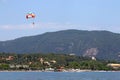 Parasailing on blue sky Corfu island Royalty Free Stock Photo