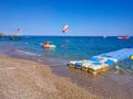 Parasailing in a blue sky near sea beach. Parasailing is a popular recreational activity among tourists in Turkey. For