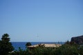 Parasailing in the Mediterranean. Parasailing is a recreational kiting activity where a person is towed behind a vehicle. Rhodes Royalty Free Stock Photo