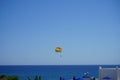 Parasailing in the Mediterranean. Parasailing is a recreational kiting activity where a person is towed behind a vehicle. Rhodes Royalty Free Stock Photo