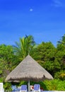 Parasol and chaise lounges Royalty Free Stock Photo