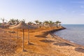 Parasols on the beach of Red Sea in Hurghada Royalty Free Stock Photo