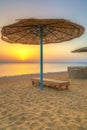 Parasols on the beach of Red Sea in Hurghada at sunrise Royalty Free Stock Photo