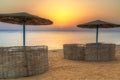 Parasols on the beach of Red Sea in Hurghada at sunrise Royalty Free Stock Photo