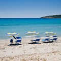 Parasols on beach, Sardinia Royalty Free Stock Photo