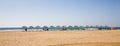 Parasols on beach, Sardinia Royalty Free Stock Photo