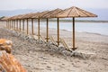 Parasols at Maleme beach on Crete Royalty Free Stock Photo