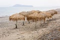 Parasols at Maleme beach on Crete Royalty Free Stock Photo