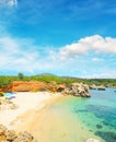 Parasols in a small beach in Alghero Royalty Free Stock Photo