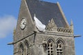 A paratrooper at the church in normandy, france in summer closeup Royalty Free Stock Photo