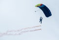 Paratrooper with Romanian flag at the Targu-Jiu air show, Romania
