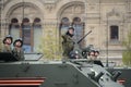 Paratroopers on armored multipurpose amphibious BTR-MDM `Rakushka` during the Victory parade on red square.