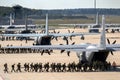 Paratroopers entering a US Air Force C-130 Hercules transport plane on Eindhoven airbase