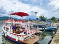 Paraty, Brazil - Jan 24, 2024: Port of Paraty, Brazil with colorful tourist and fishing boats