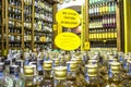 bottles of cachaca on a shelf, inside a shop in the historic city of Paraty