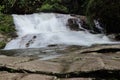 Paraty/Rio de Janeiro/Brazil - Pedra Branca waterfall, touristic place. Cold water runs through the rocks