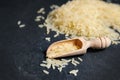 Parboiled rice in a wooden scoop Royalty Free Stock Photo
