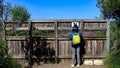 Parc Natural de s\'Albufera des Grau, Menorca, Spain. woman looks from behind observation point