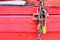 Parcel with chain and padlock