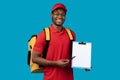 African american delivery man posing folder and pen Royalty Free Stock Photo