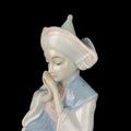 Parcel statuette of a young girl. porcelain antique girl figurine