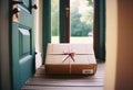 Parcel on the threshold of the entrance to the house near the door, delivery of goods to the house