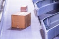 Parcels on conveyors with blurred industrial background Royalty Free Stock Photo