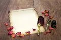 Parchment Paper Scroll with Rose Petals for Valentines Love Letter Royalty Free Stock Photo