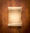 Parchment scroll on wooden background Royalty Free Stock Photo