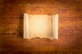 Parchment scroll on wooden background Royalty Free Stock Photo