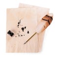 Parchment with stains of ink, feather pen and inkwell on white background, top view Royalty Free Stock Photo