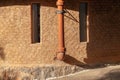 Pareidolia face house brick wall
