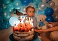 Parent and child celebrating first birthday Royalty Free Stock Photo