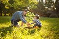 Parent and child planting tree Royalty Free Stock Photo