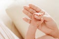 Parent hands holding newborn baby fingers, Close up mother`s hand holding their new born baby. Love family healthcare and medical Royalty Free Stock Photo