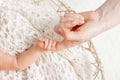 Parent hands holding newborn baby fingers, Close up mother`s hand holding their new born baby. Love family healthcare and medical Royalty Free Stock Photo