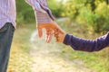 The parent holding the child`s hand with a happy background Royalty Free Stock Photo