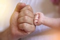 Parent Holding in the Hands Feet of Newborn Baby. Royalty Free Stock Photo