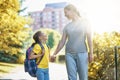 Parent and pupil go to school Royalty Free Stock Photo