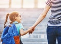 Parent and pupil go to school Royalty Free Stock Photo