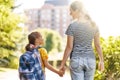 Parent and pupil go to school