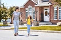 Parent and pupil go to school