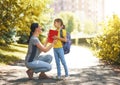 Parent and pupil go to school Royalty Free Stock Photo